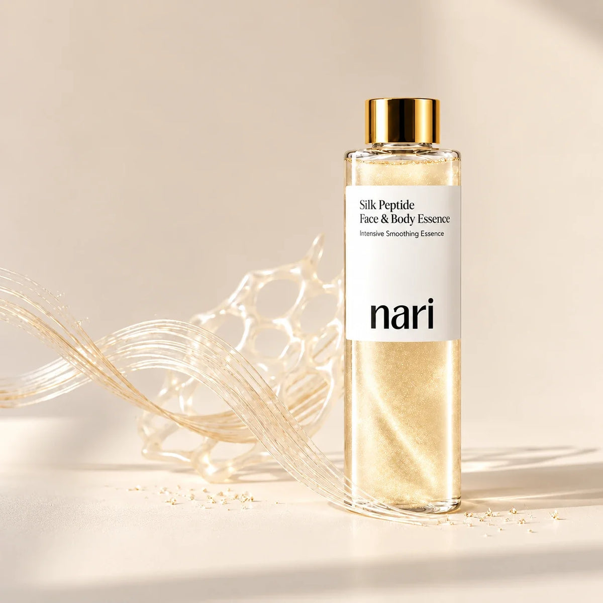 nari Silk Peptide Face & Body Essence bottle with silk strands