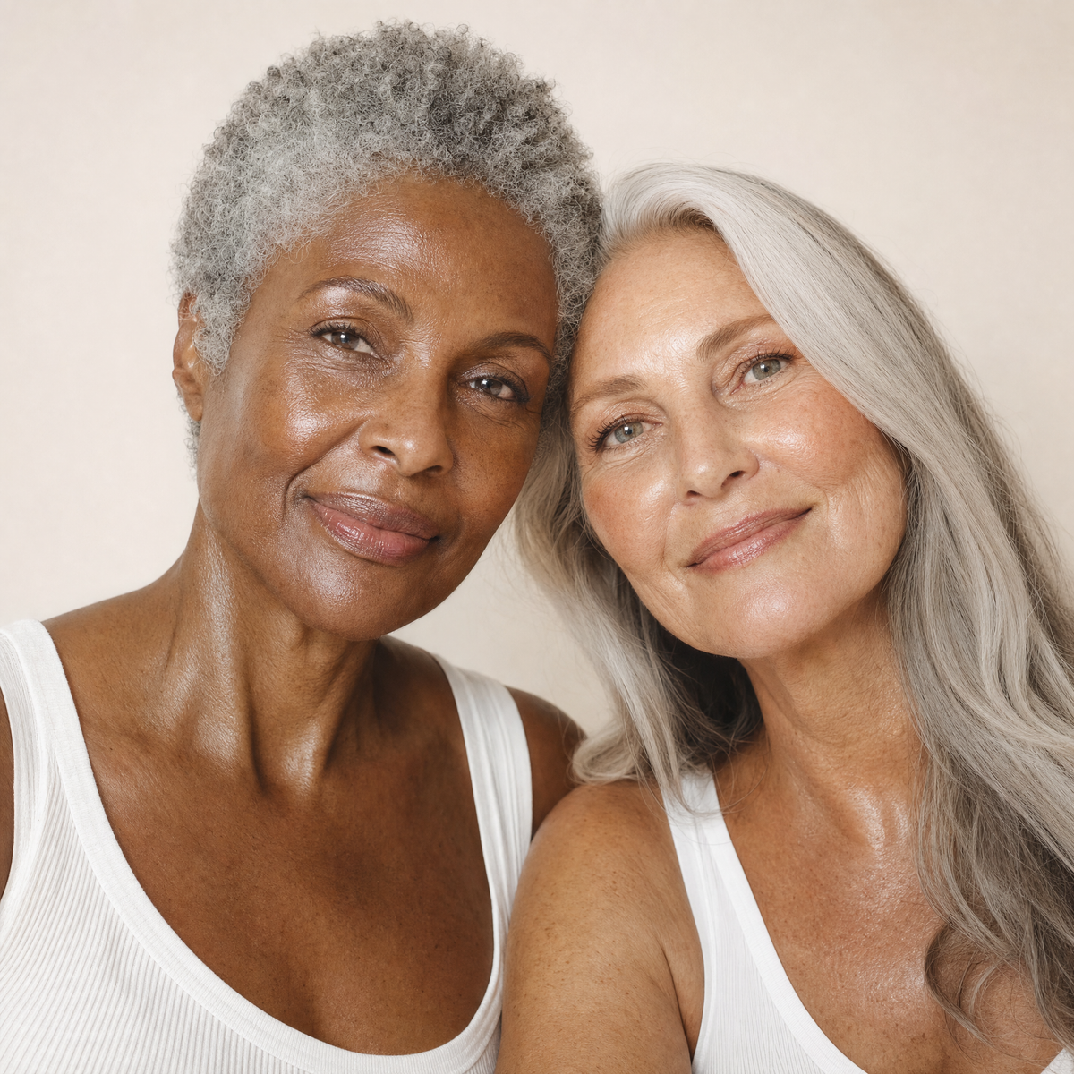 Two women with glowing skin